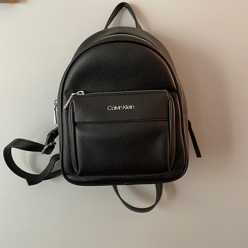 Calvin Klein black mini backpack.